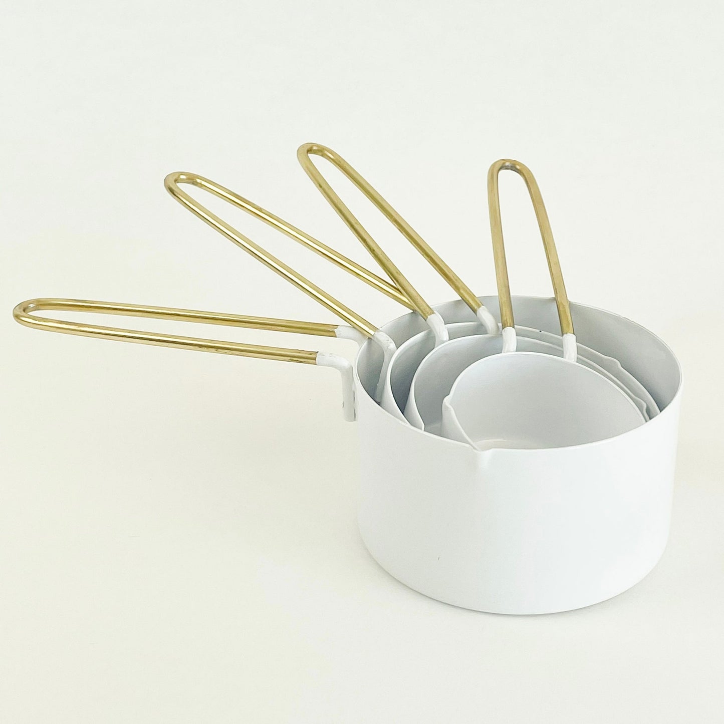 White Enameled/Gold Handle Measuring Cups