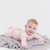 pink dogwood modal magnetic parent favorite footie with ruffles