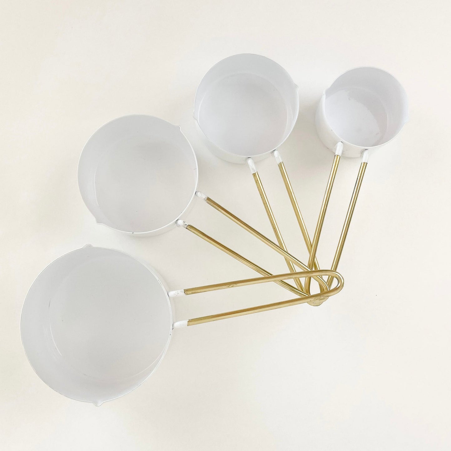 White Enameled/Gold Handle Measuring Cups